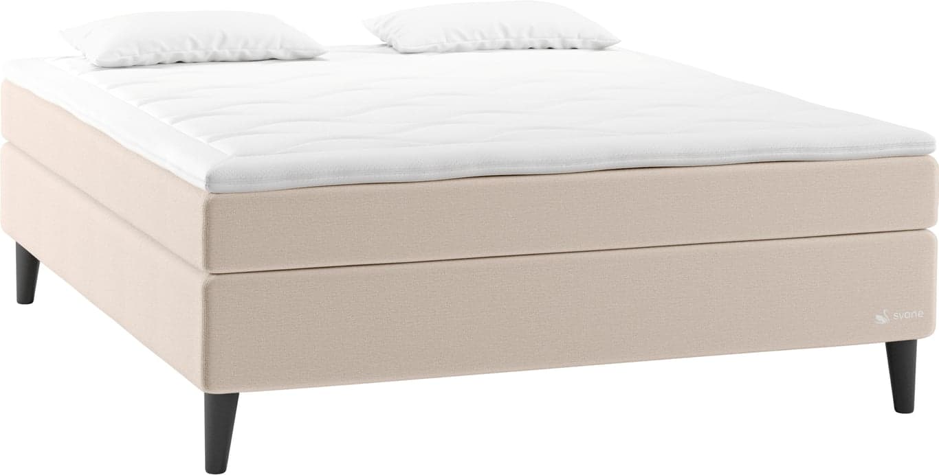 $Bilde av Svane® Lux kontinentalseng 150x200 (Embrace Elastec overmadrass, stoff Moment Beige, cone ben H19 cm)